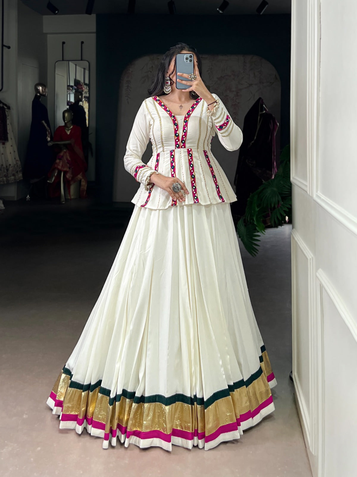 Let your Navratri nights shine brighter with the sparkle of mirror Gamthi work and the effortless flow of rayon fabric