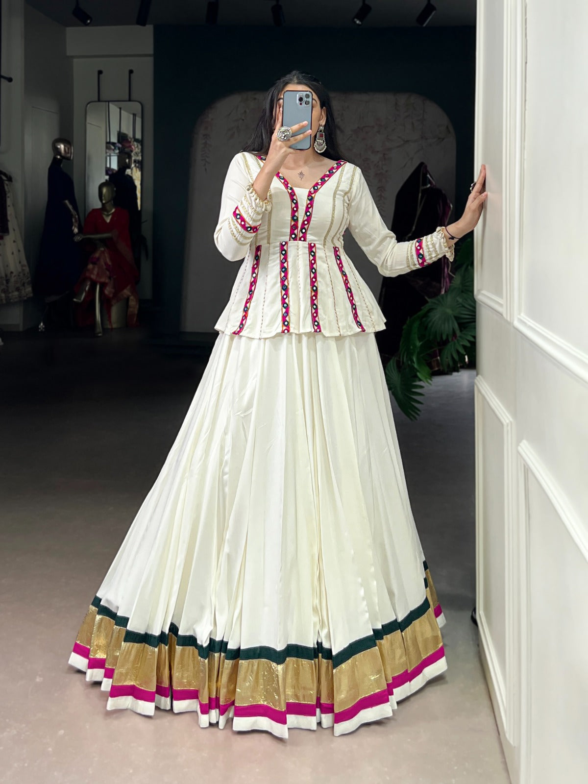 Let your Navratri nights shine brighter with the sparkle of mirror Gamthi work and the effortless flow of rayon fabric