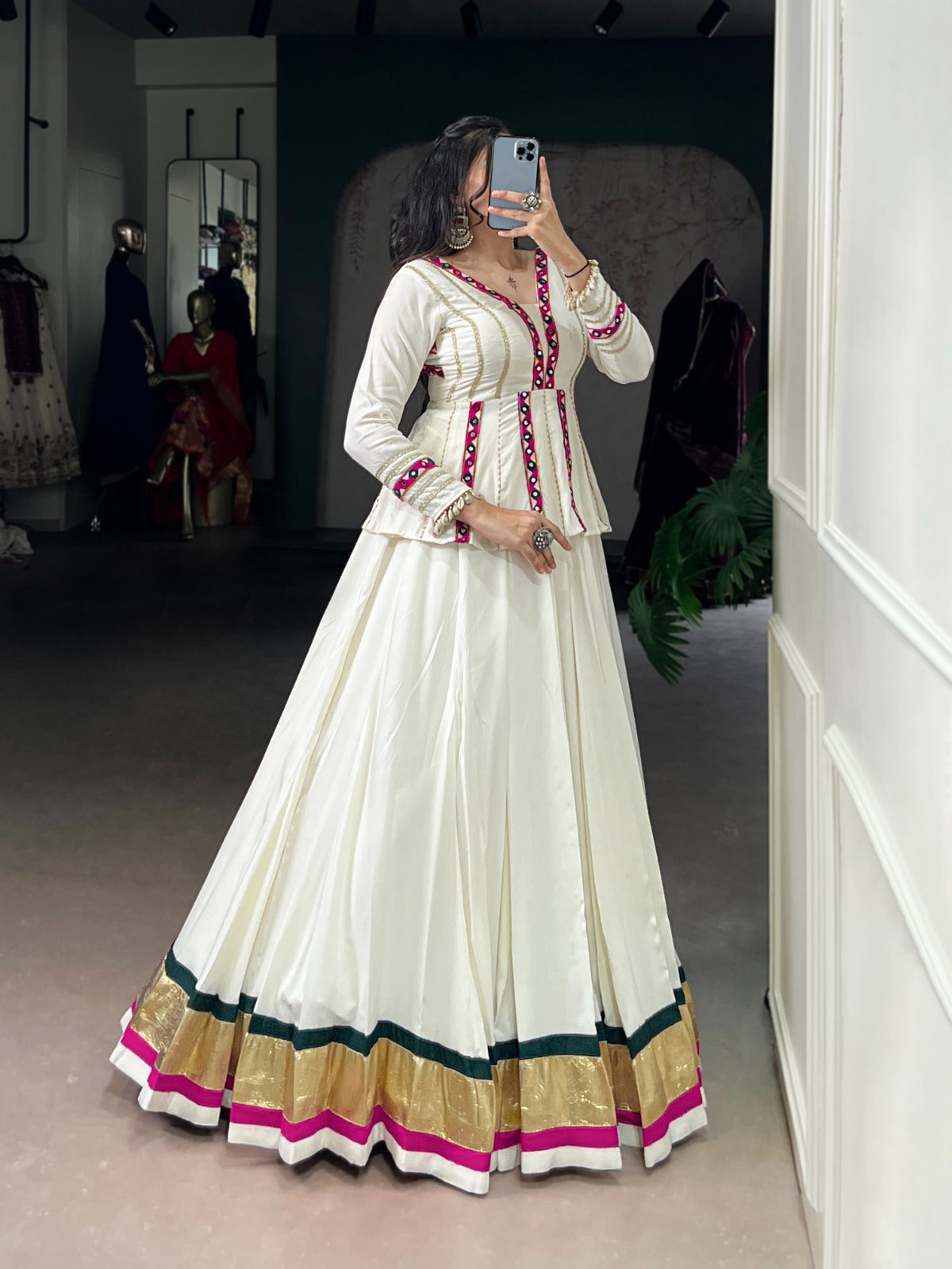 Let your Navratri nights shine brighter with the sparkle of mirror Gamthi work and the effortless flow of rayon fabric