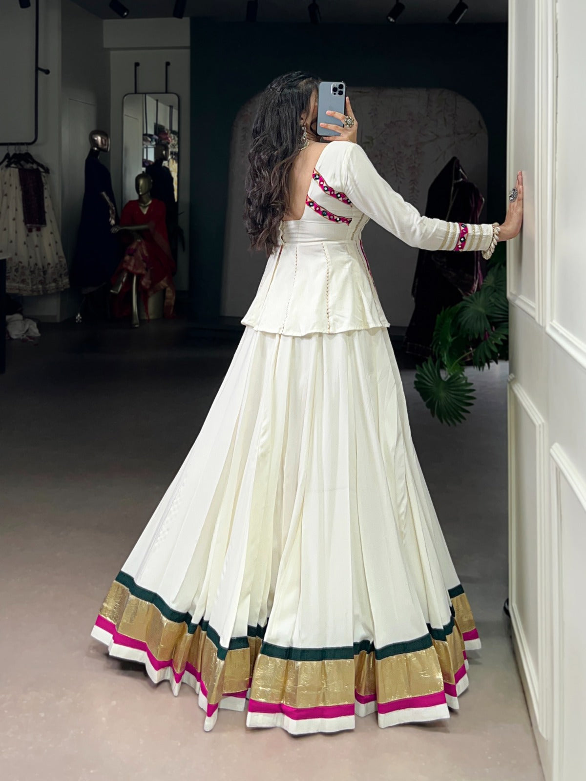 Let your Navratri nights shine brighter with the sparkle of mirror Gamthi work and the effortless flow of rayon fabric