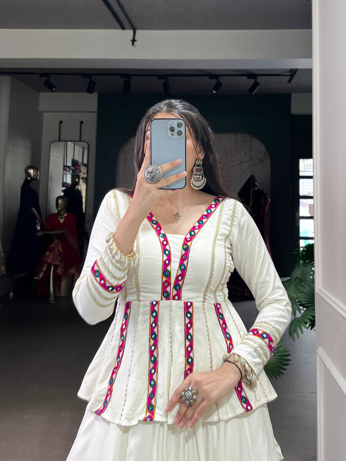 Let your Navratri nights shine brighter with the sparkle of mirror Gamthi work and the effortless flow of rayon fabric