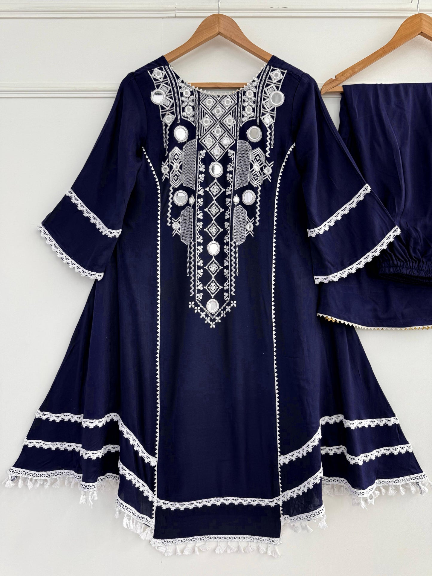 Step into effortless charm with our exclusive 2-piece set – crafted for comfort, stitched with grace.
