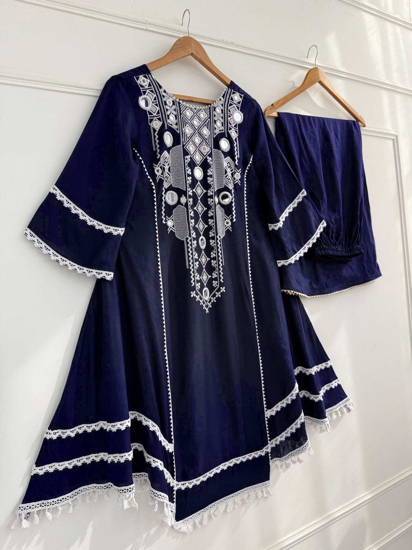 Step into effortless charm with our exclusive 2-piece set – crafted for comfort, stitched with grace.