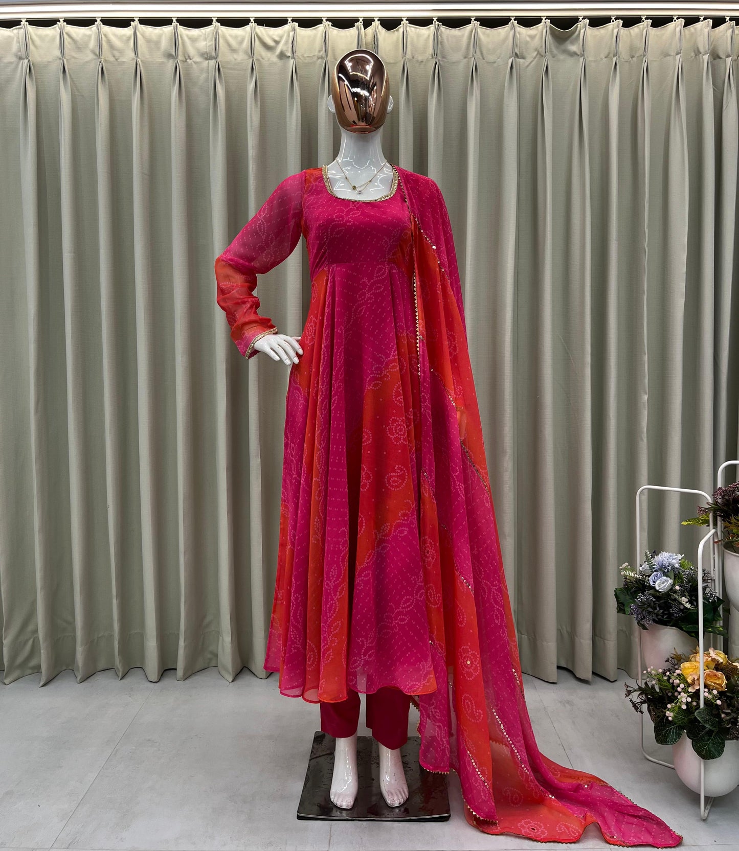 Comfortable gown with faux georgette fabric with printed work with stitched pant and dupatta