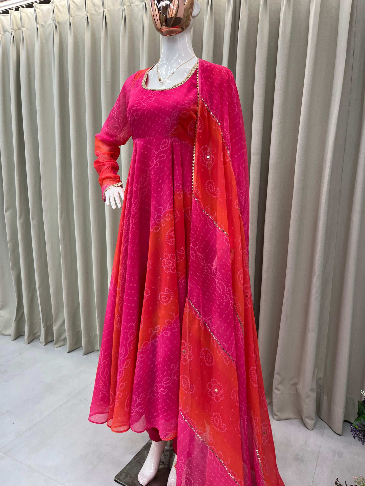 Comfortable gown with faux georgette fabric with printed work with stitched pant and dupatta