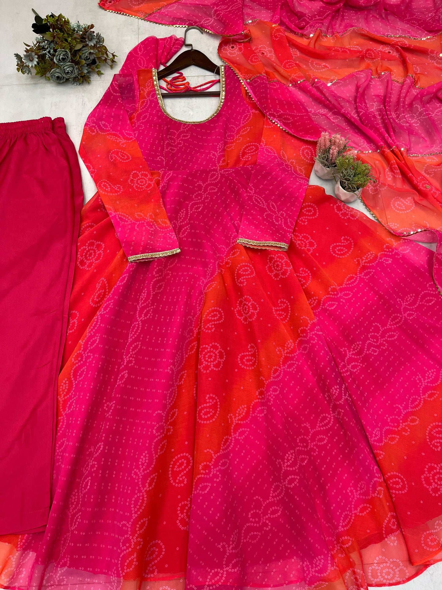 Comfortable gown with faux georgette fabric with printed work with stitched pant and dupatta