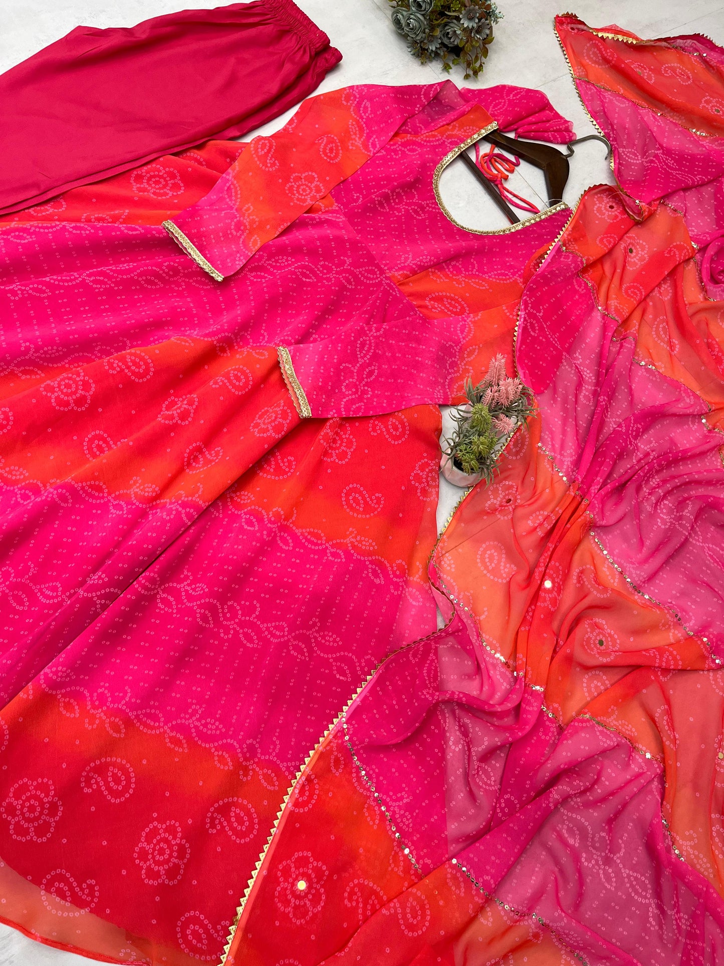 Comfortable gown with faux georgette fabric with printed work with stitched pant and dupatta