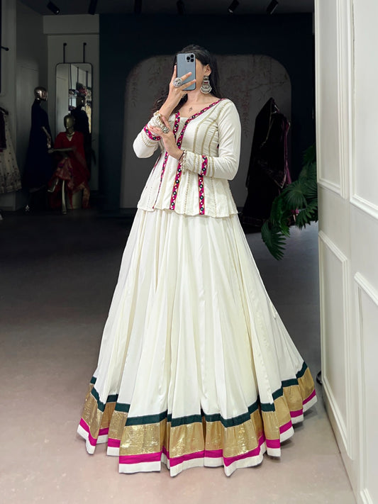 Let your Navratri nights shine brighter with the sparkle of mirror Gamthi work and the effortless flow of rayon fabric