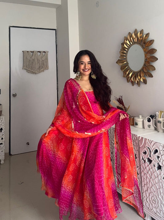 Comfortable gown with faux georgette fabric with printed work with stitched pant and dupatta